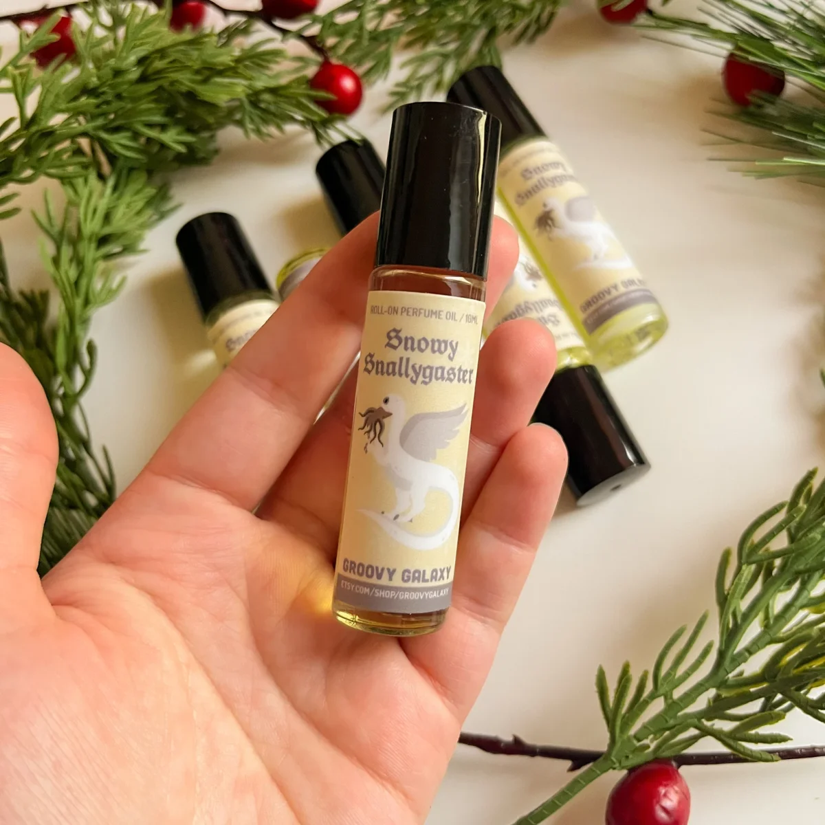 Snowy Snallygaster Roll On Perfume Oil by Groovy Galaxy